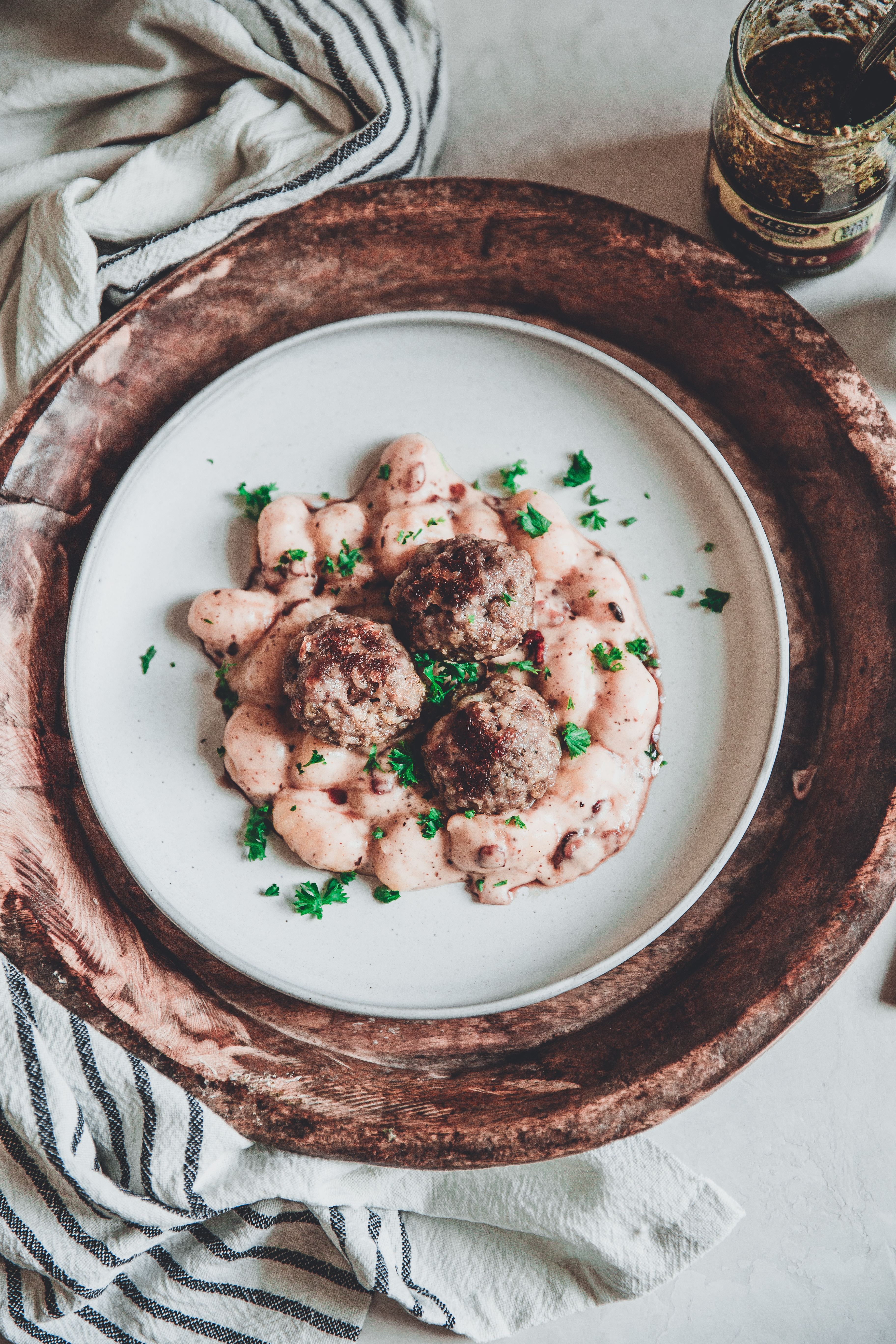 Baked Pesto Pork Meatballs with Creamy Gnocchi