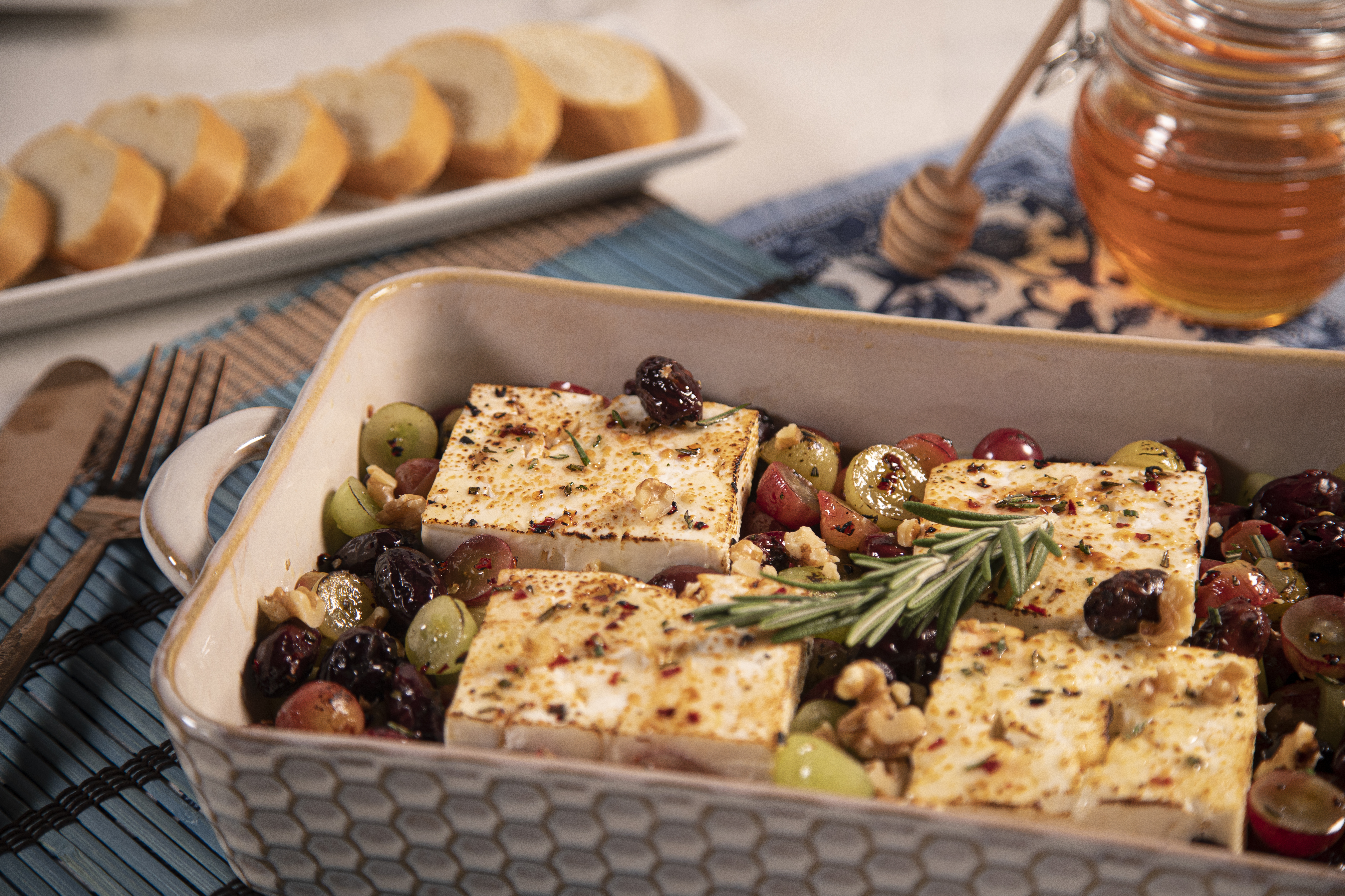 Baked Feta with Grapes, Olives and Honey